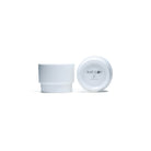 White ceramic cup with lid on a white background